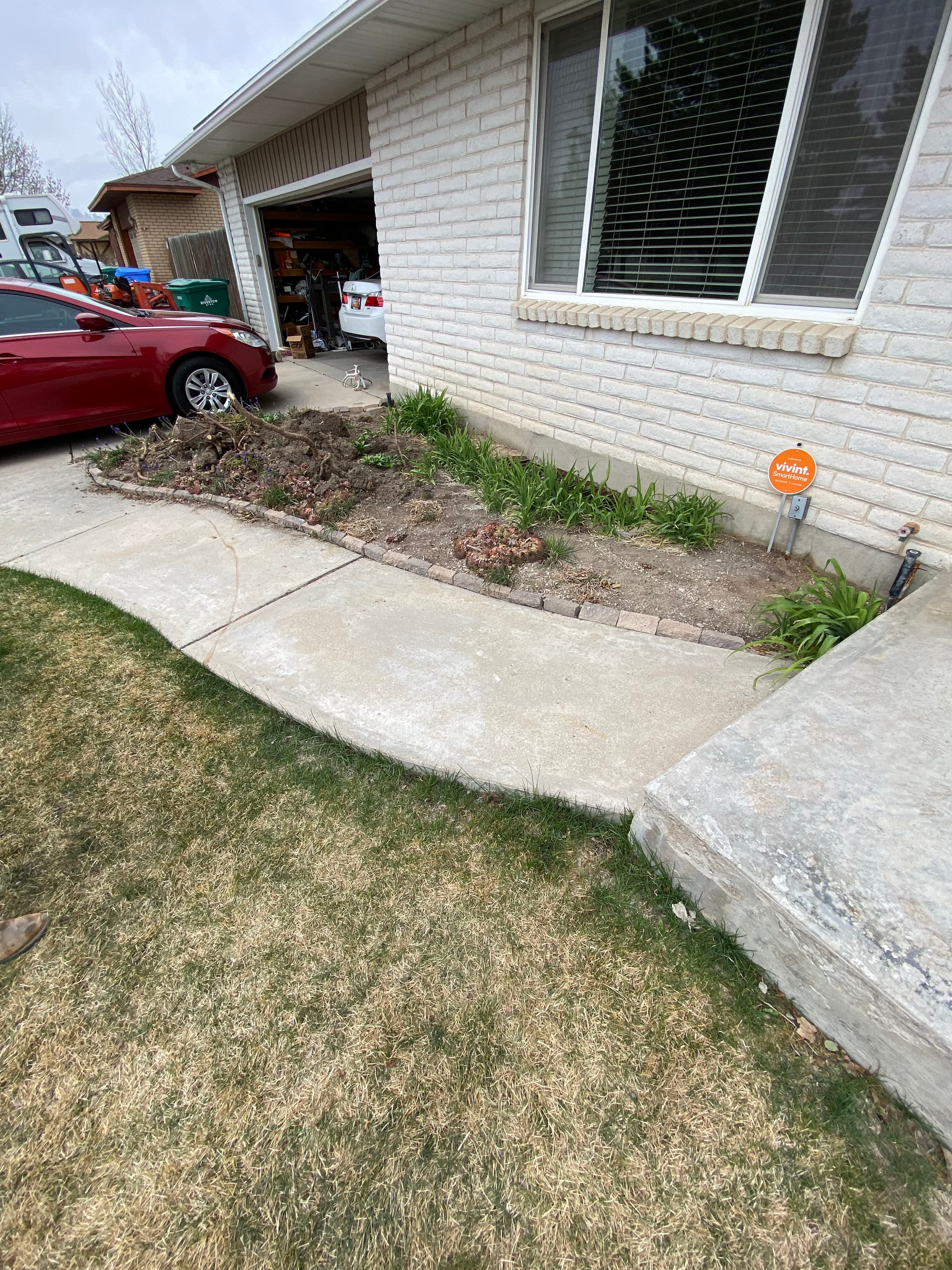 Project Front Bed Dry River Bed Design with Drip-Fed Pots image