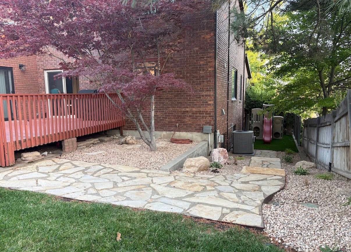 Flagstone Patio and Turf Play Area Built for Real Family Life